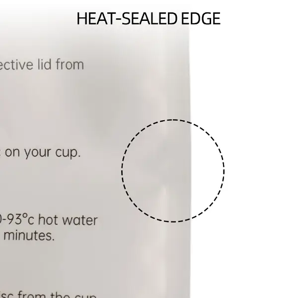 Tear notch and heat-sealed edge on UFO coffee sachet